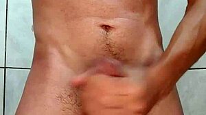 soldadogoza jerks off big cock before shower, shooting cumshot