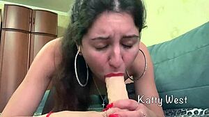 Katty West in stockings sucks and fucks dildo to massive orgasm