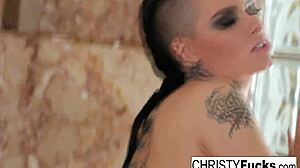 Watch Christy Mack masturbate her tattooed ass in the shower
