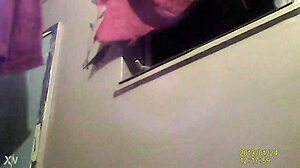 a lady uses the bathroom while being spied on