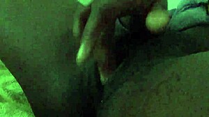 The black slut squirts and fingers her perfect wet pussy, moaning.