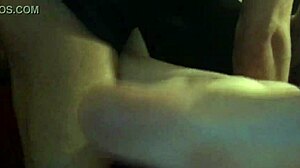 Huge cock delivers massive cumshot on brunette babe's face and mouth in hardcore homemade scene.