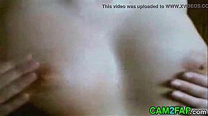 Fingering shaved pussy on webcam and tasting it