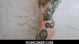 Busty inked milf stepmother joanna angel feels intense pleasure as stepson fucks her in the shower