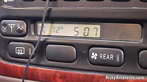 She fingers her pussy in the car