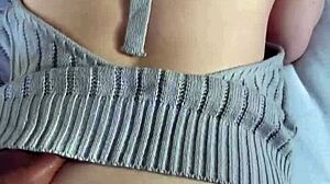 Fucked Japanese girl doggystyle in her pullover, cum on ass.