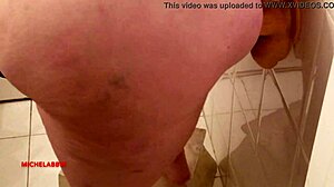 Fat amateur plays with big dildo in bathroom