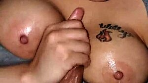 Stroking Massive Cock with Big Tits on Display