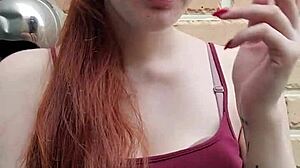 redhead alice indulges in smoking session