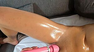 My photographer rubs oily massage on my screaming blonde body for intense orgasm.