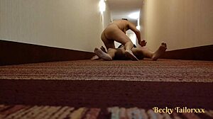 Scared couple fucks in hotel hallway