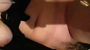 is this hot teen masturbating with bottle on big tits