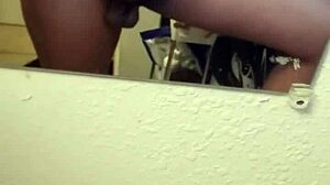 Black guy strokes his cock in solo masturbation