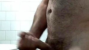 Intense jerking session leading to cum in the toilet with a big cock