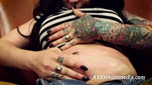 Gainer Camille Black shows off big belly.