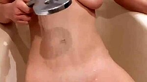 Sexy milf jumps on pillow with big tits bouncing, then bathes showing hairy pussy.