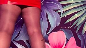 Tease in pantyhose and latex dress