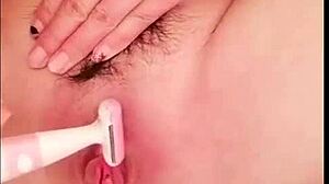 A chinese girl shaves her pussy