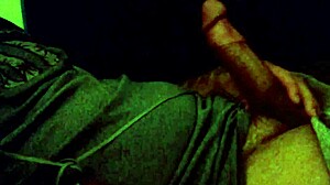 Tattooed girl masturbates with big cock on webcam