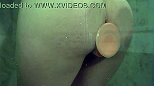 Babe Sucks Dildo and Fucks Her Shaved Pussy to Orgasm in Shower Close-Up