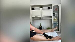 Sugarnadya waxes clients' slender legs in close-up fetish