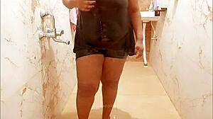 Asian MILF sensually bathes in shower, revealing her wet body and curves