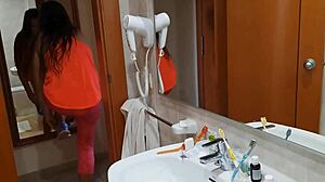 Watch her tease her wet pussy in the gym shower after a workout!