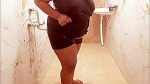 Asian MILF sensually bathes in shower, revealing her wet body and curves