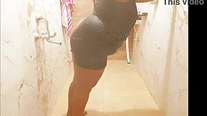 Asian MILF sensually bathes in shower, revealing her wet body and curves