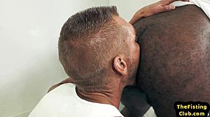 this hunk gets fisted by big black cock in interracial assfuck