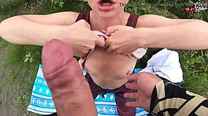 Hot blonde deepthroats dick in nature recreation.