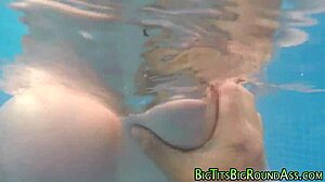 Busty babe gets titfucked outdoors