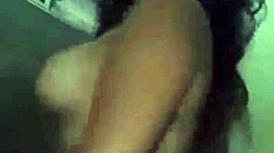 Is this slutty african teen 18+ flashing her tits in public?