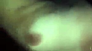 Is this slutty african teen 18+ flashing her tits in public?