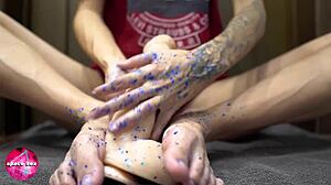 girl, you playing with glitters and giving footjob to big dildo?