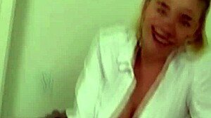 Busty young girl blows cock