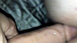 She straps on and fucks her ass deep in casual anal play