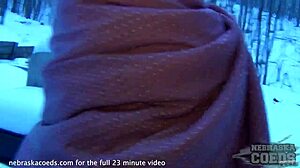 Watch this Iowa girl use her big black dildo and make a naked snow angel.