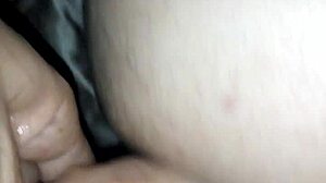 She straps on and fucks her ass deep in casual anal play