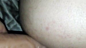 She straps on and fucks her ass deep in casual anal play