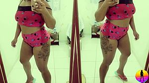 Brazilian milf belly dancer performs with big tits and ass shaking.