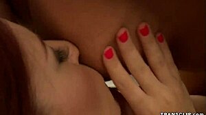 check out this shemale camgirl fucking a redhead babe in kinky session