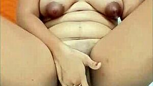 watch this colombian teen squirting and orgasming with milf