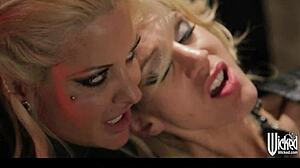 Yo, watch these tattooed goth girls share a studded cock in threesome!