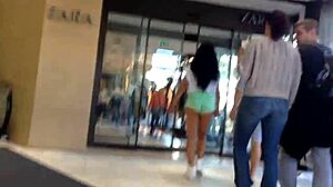 girl in booty shorts walks the street