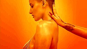 blonde with short hair dances oiled to atlanta hypno music video