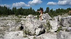 Topless dance in white stone quarry