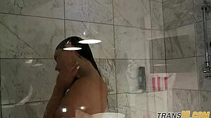 Smalltitted tranny enjoys a steamy shower while being filmed