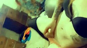 Sexy transsexual in stockings, heels, and lingerie strokes her small cock sensually