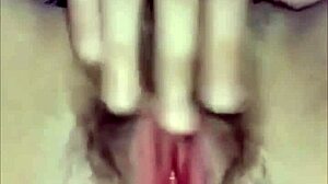 this horny pinay babe fingering her wet shaved pussy and cumming